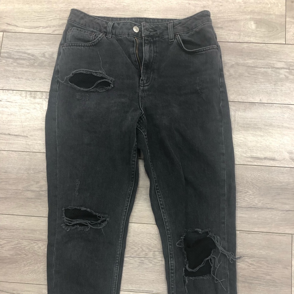 Black top shop jeans with mesh detail.